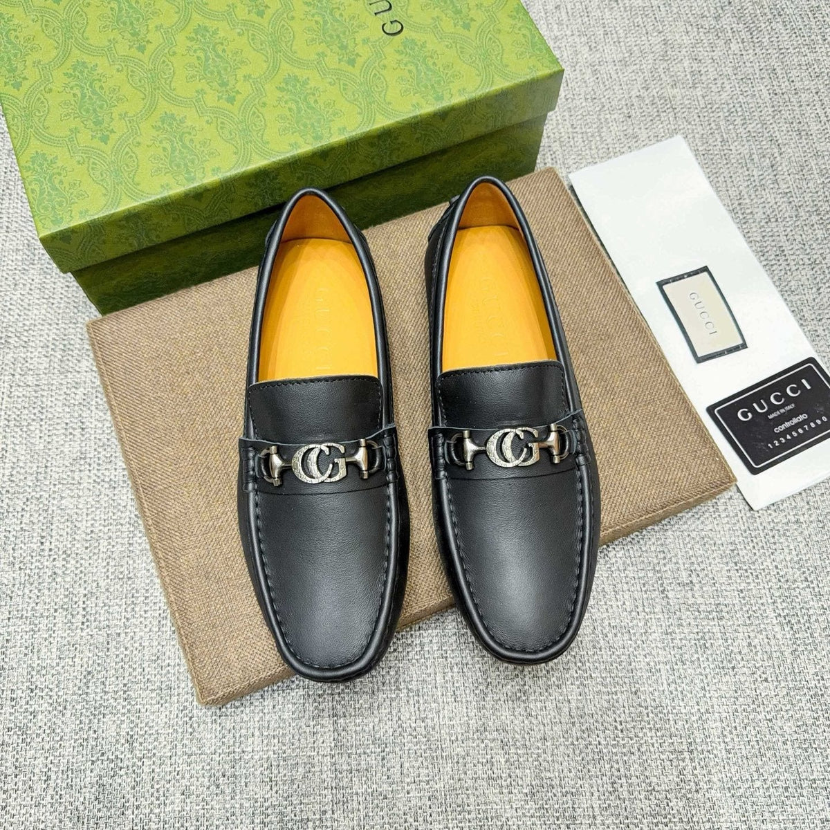 GUCCI Black Metal-Detail Loafers — front