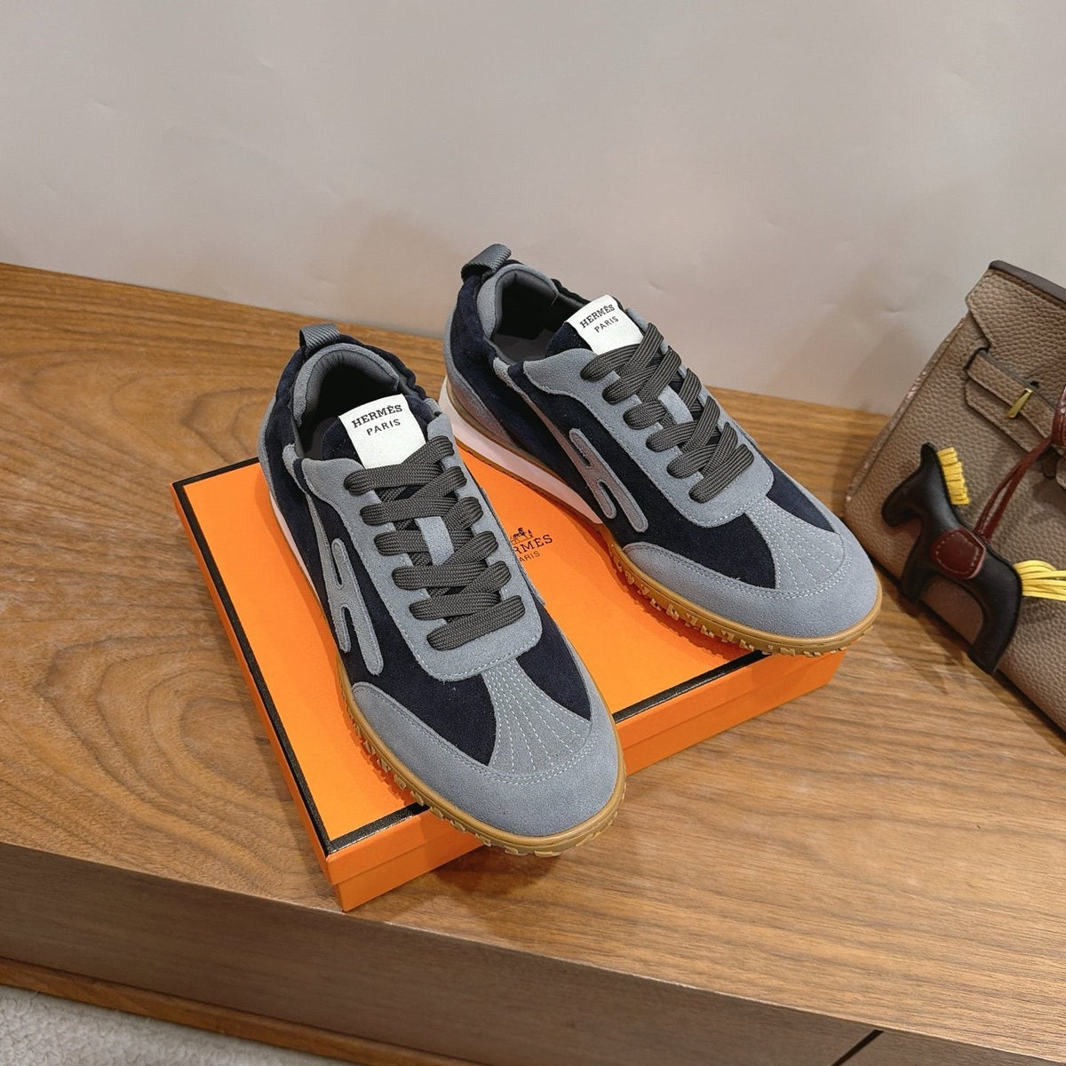 Hermès Contrast-Panel Low-Top Sneakers — hero